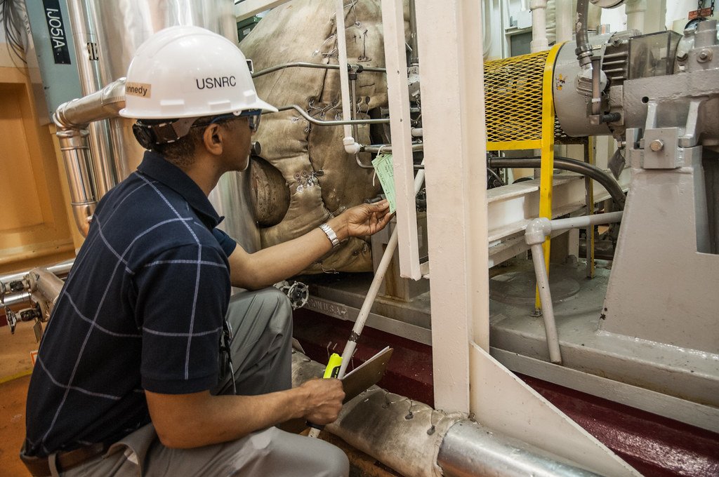 A Nuclear Regulatory Commission inspector carries out a routine inspection at the Calvert Cliffs nuclear plant in Maryland in May 2012.